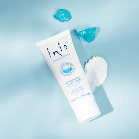 Inis hand cream on bathroom shelf showing lifestyle hydration use