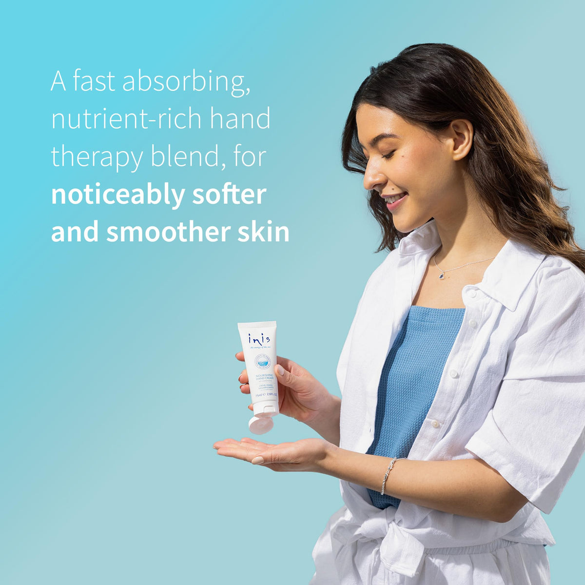 Inis hand cream next to common items showing 2.6 fl oz scale