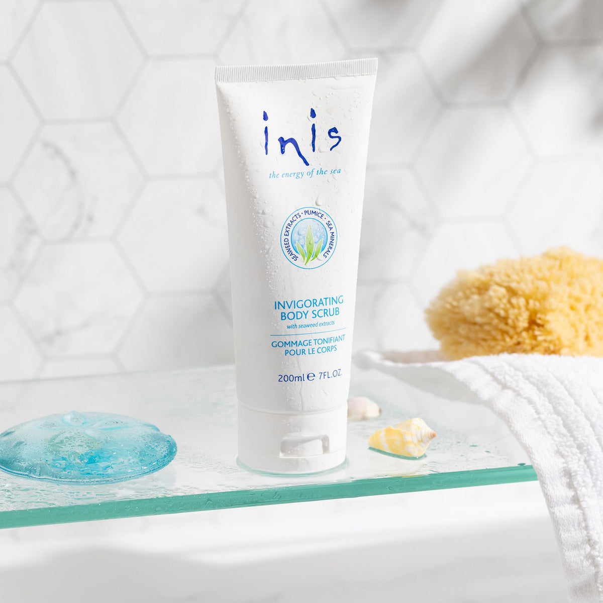Close-up scrub texture with Irish moss and pumice highlighting exfoliation benefit