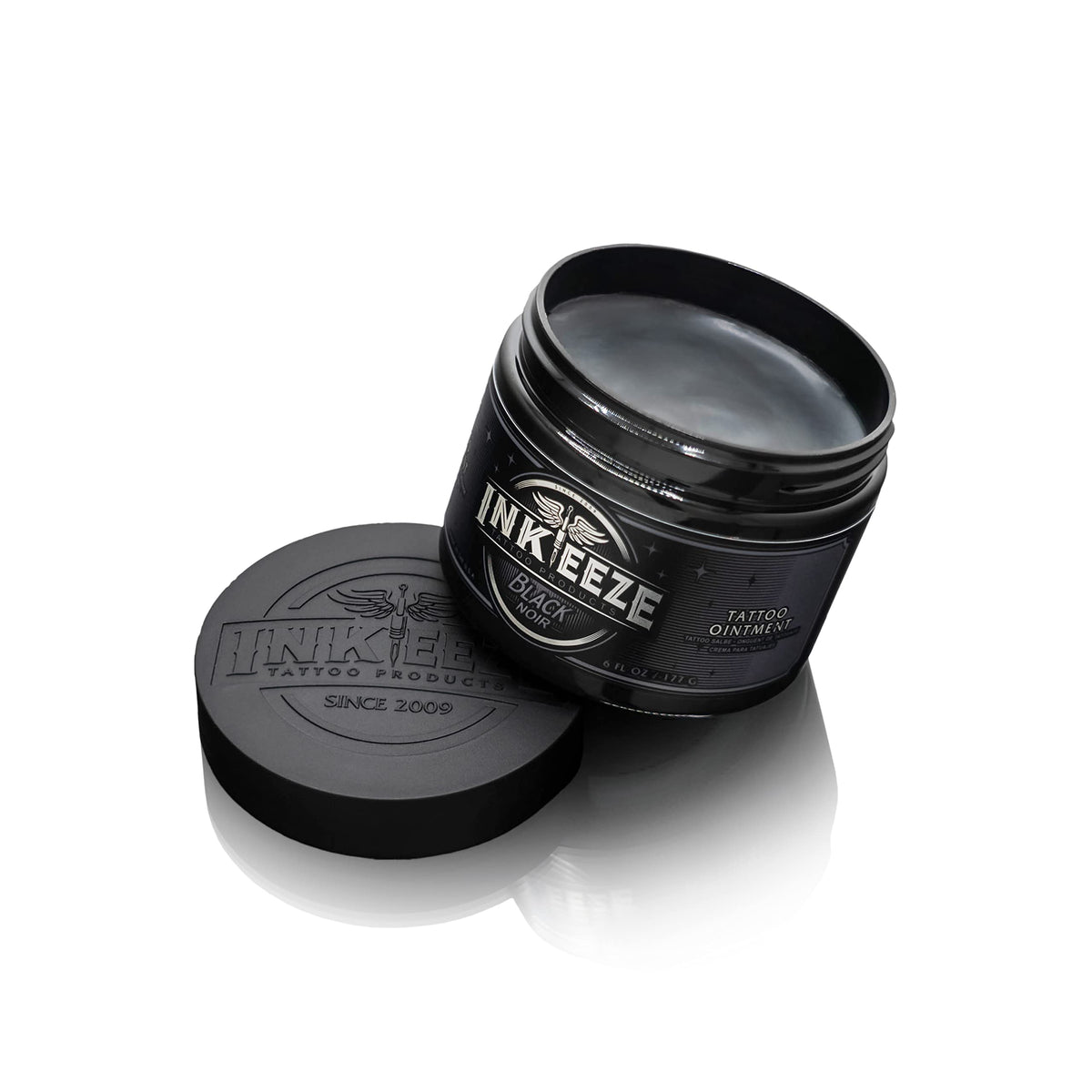 INK-EEZE open jar texture showing spreadable petroleum-free balm