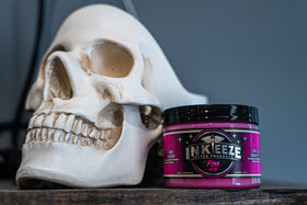 INK-EEZE jar in hand for size comparison, demonstrating travel-ready 6oz convenience benefit