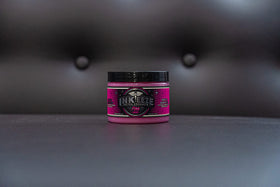 INK-EEZE lifestyle shot with bubble gum scent imagery conveying pleasant fragrance benefit