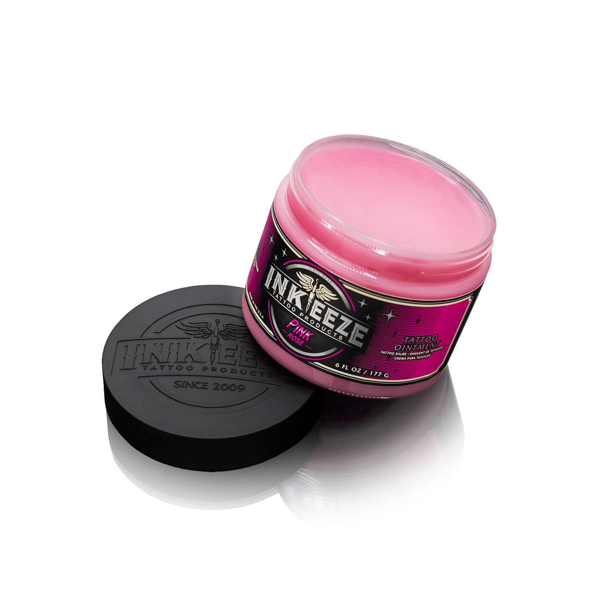 INK-EEZE open jar close-up showing smooth pink balm texture and easy application benefit