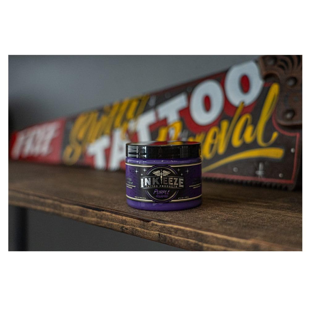 INK-EEZE purple ointment in a tattoo studio setting, illustrates professional use by artists