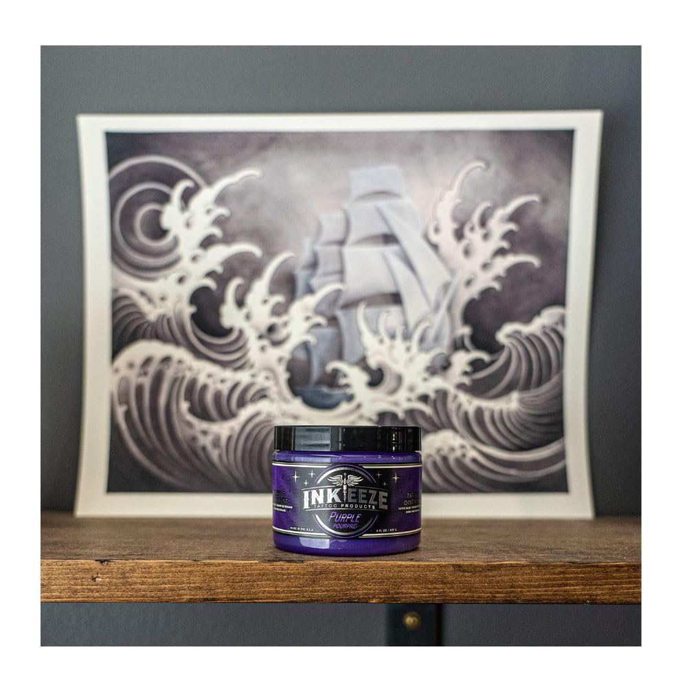 INK-EEZE purple ointment jar next to a ruler, conveys 6oz size and long-lasting supply