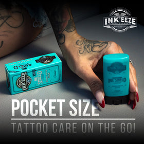 INK-EEZE held in hand to show pocket-size travel convenience