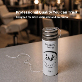 Ink Permanent built-in cutter detail demonstrating easy one-handed length control