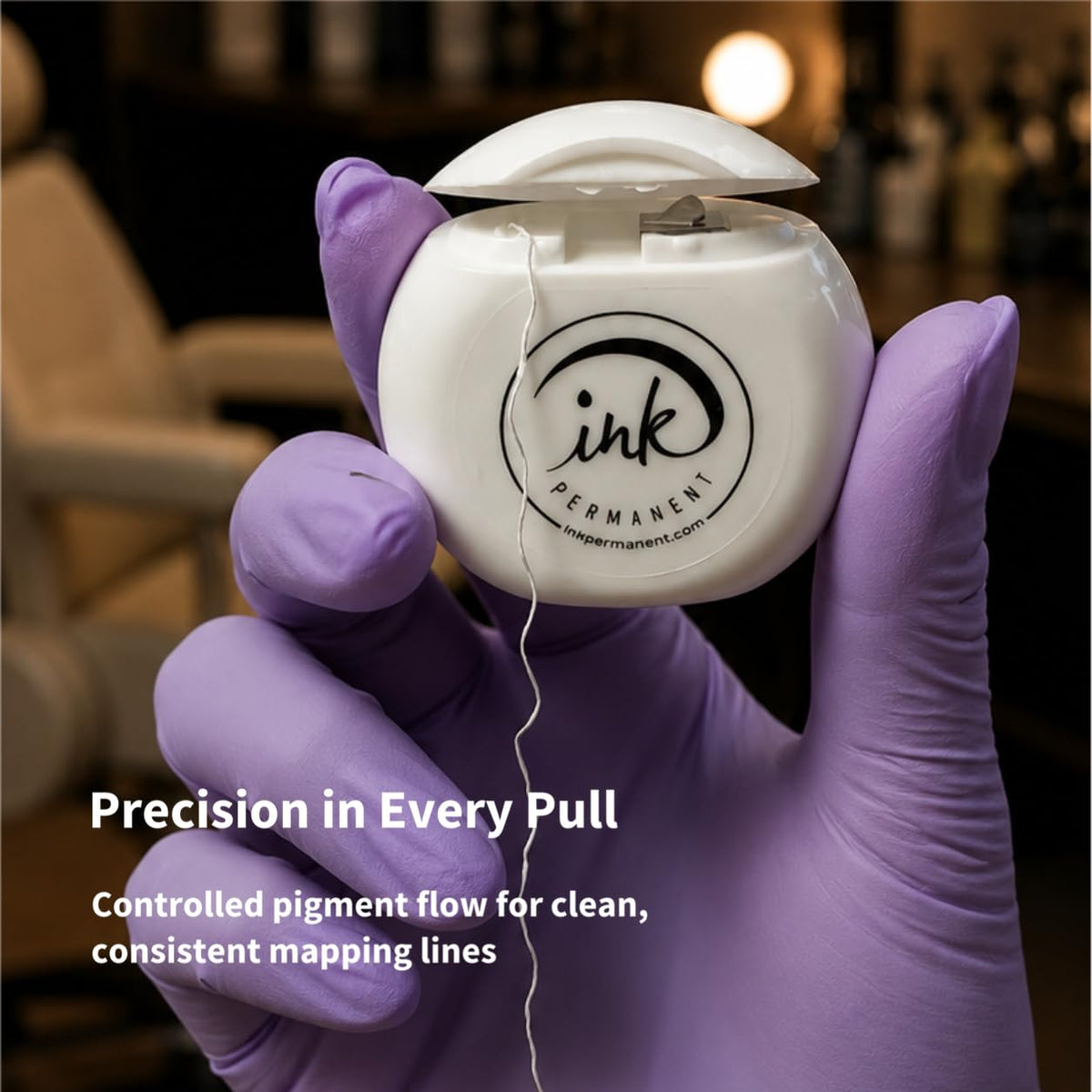 Ink Permanent dispenser with built-in cutter detail for fast hygienic length cuts