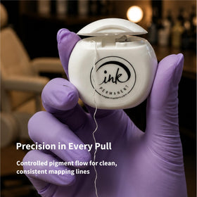 Ink Permanent dispenser with built-in cutter detail for fast hygienic length cuts
