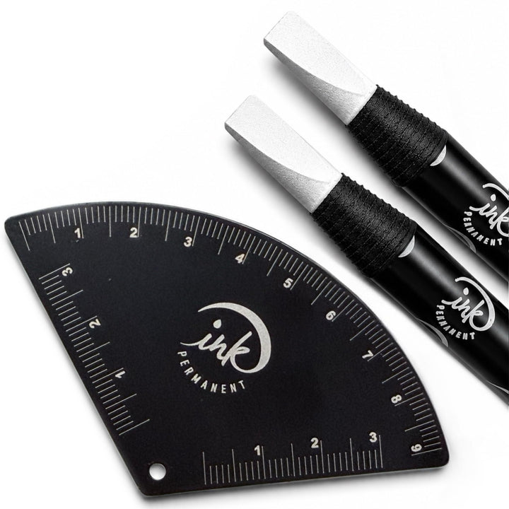 Ink Permanent front view showing ruler and pencils for precise brow mapping