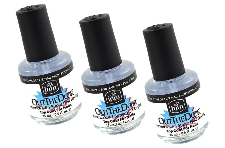 inm Out The Door front packaging showing three compact bottles and quick-dry benefit