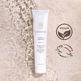 INNERSENSE applying mask to hair mid-lengths demonstrating hydration and manageability