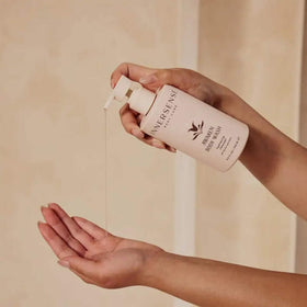 INNERSENSE Awaken in shower being applied to skin for gentle cleansing benefit
