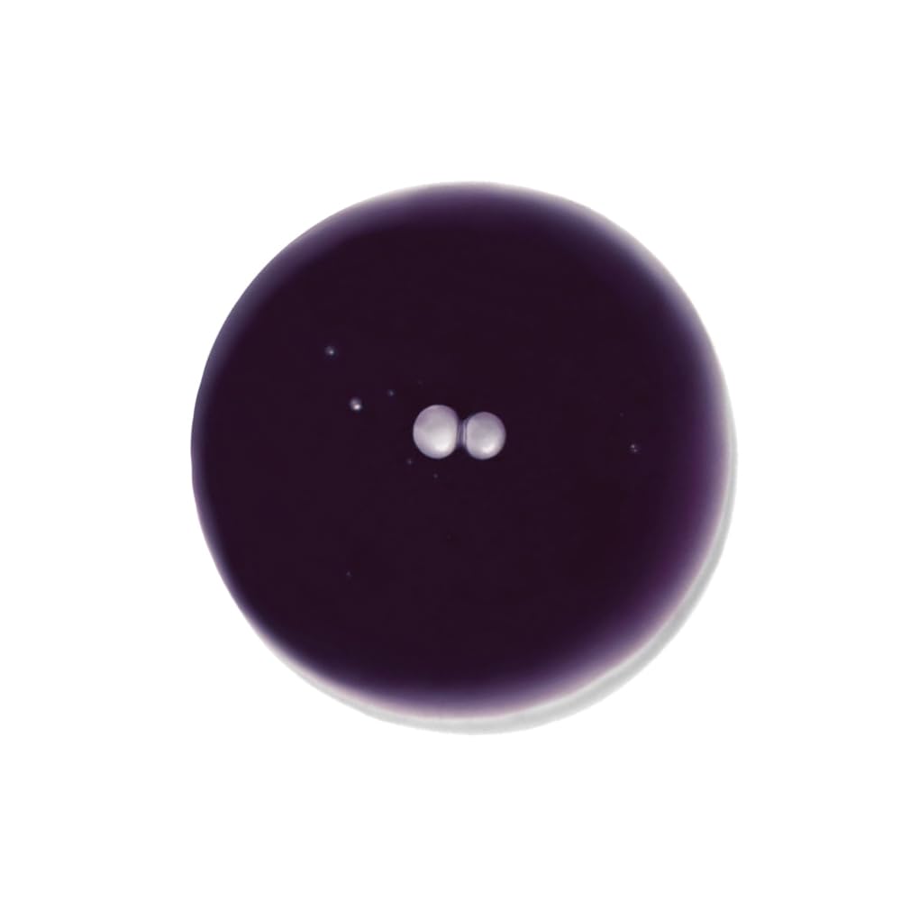 INNERSENSE pour of violet-toned shampoo showing creamy texture and hydration