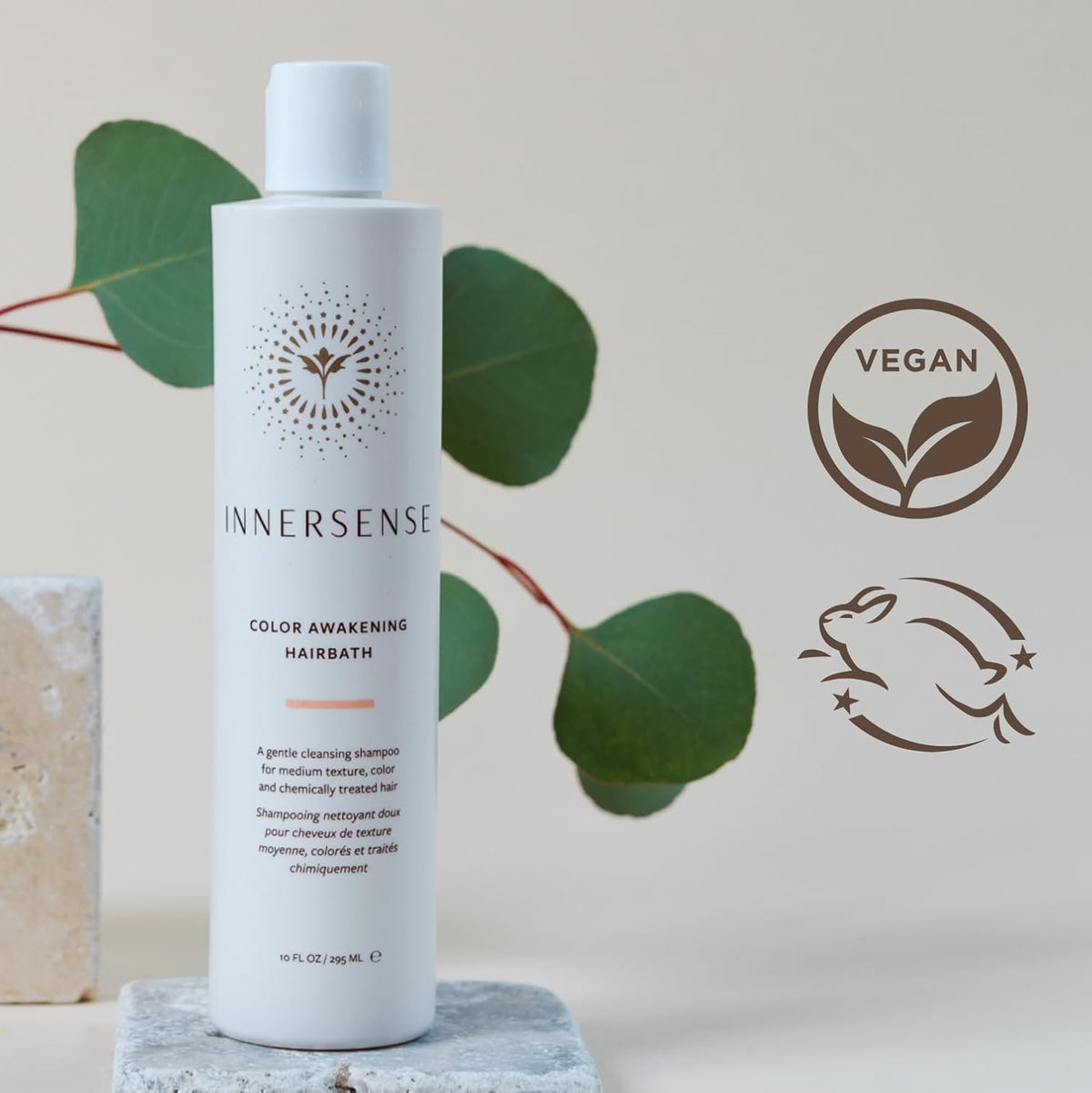 INNERSENSE conditioner creamy texture swirled on hand demonstrating moisturization and smoothing benefits