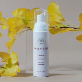INNERSENSE applied to roots in a lifestyle scene showing added volume and refreshed hair between washes