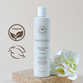 INNERSENSE shampoo in use massaging scalp to hydrate and gently cleanse hair