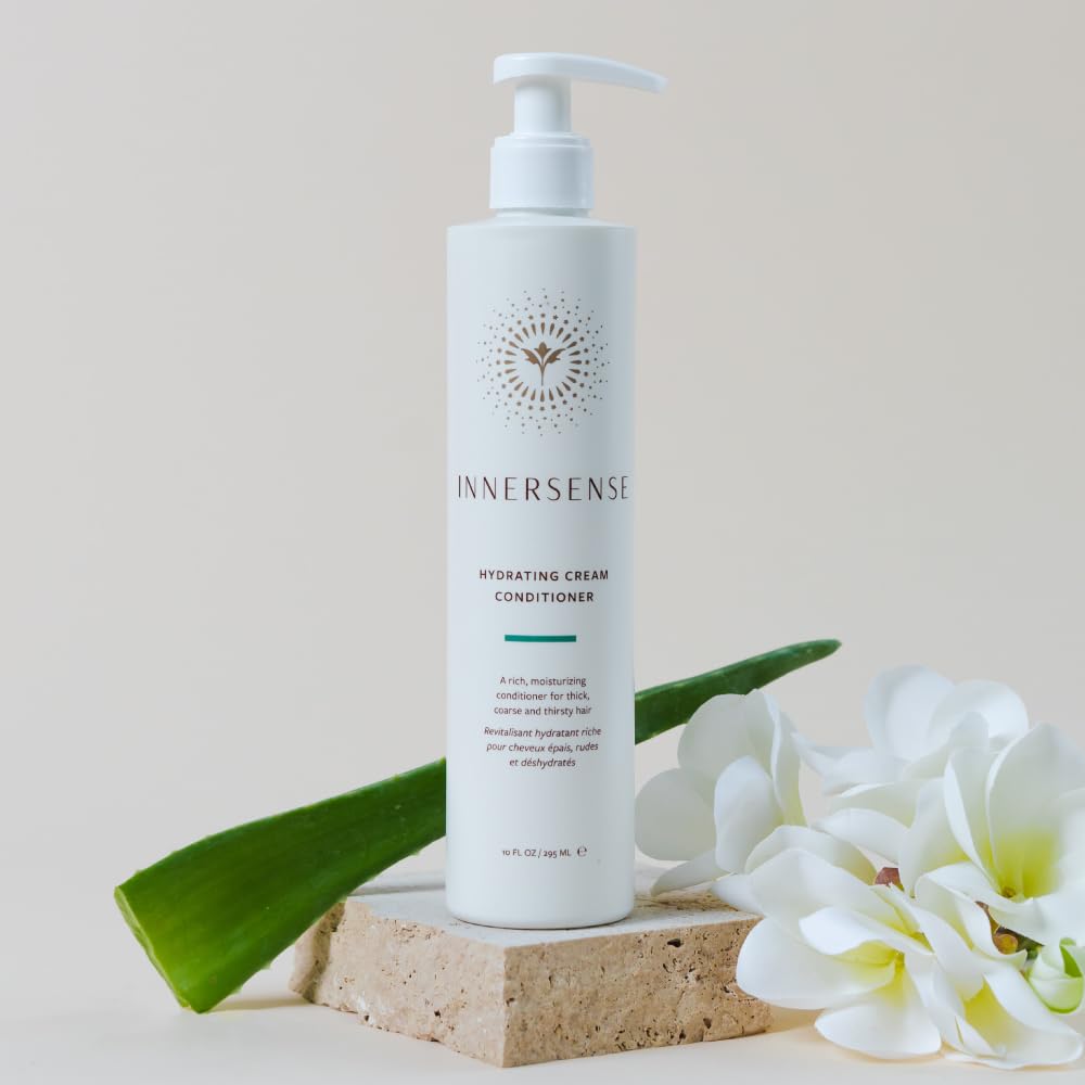 INNERSENSE size comparison with hand showing 10oz travel-friendly portion benefit