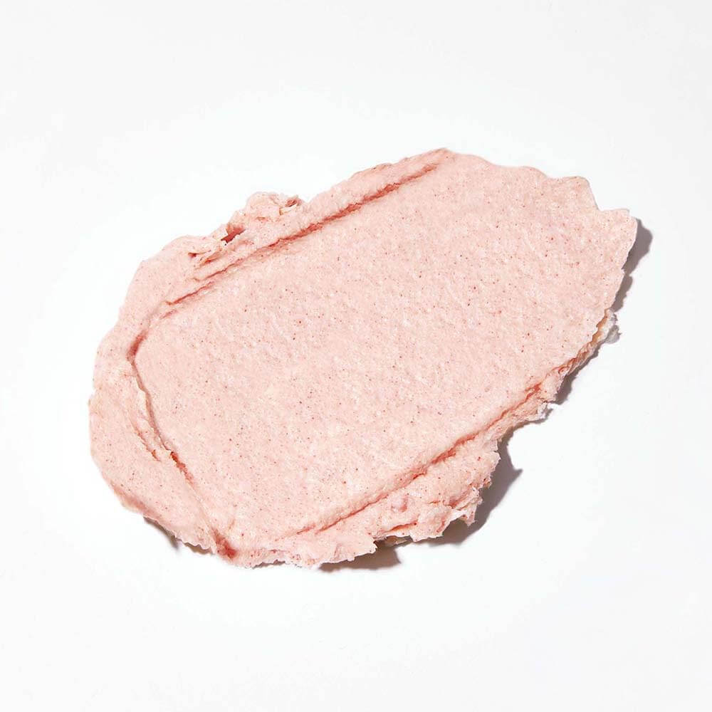 INNERSENSE texture close-up revealing fine Hawaiian red salt grains for effective exfoliation