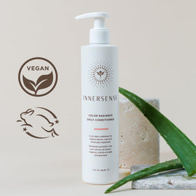 INNERSENSE creamy conditioner texture on hand showing slip and hydration benefit
