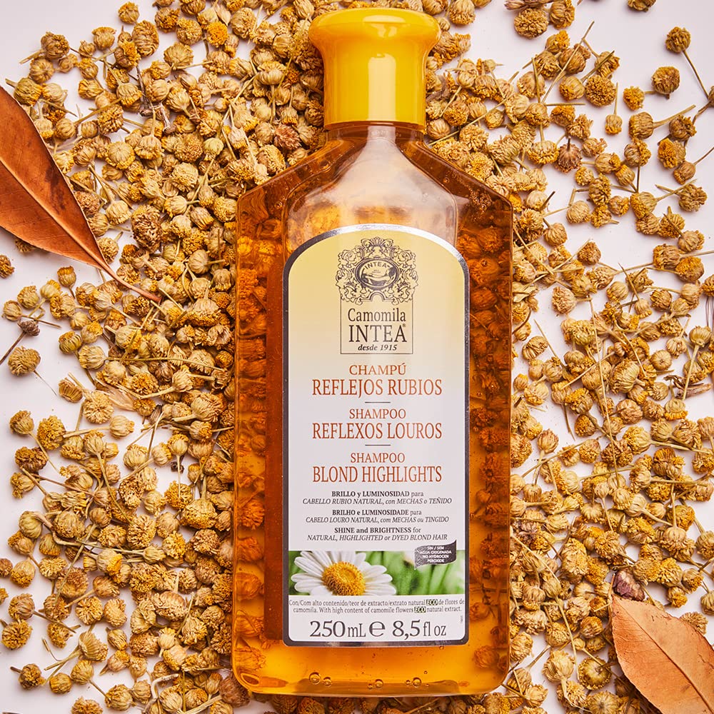 Intea bottle beside chamomile flowers emphasizing natural extract