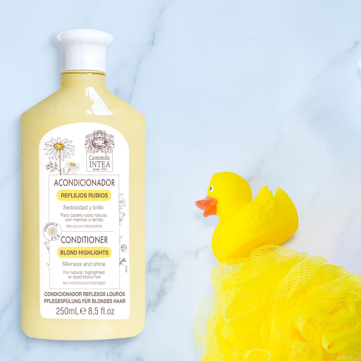 Intea lotion spray application on towel-dried hair for gradual brightening