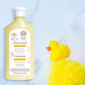 Intea lotion spray application on towel-dried hair for gradual brightening