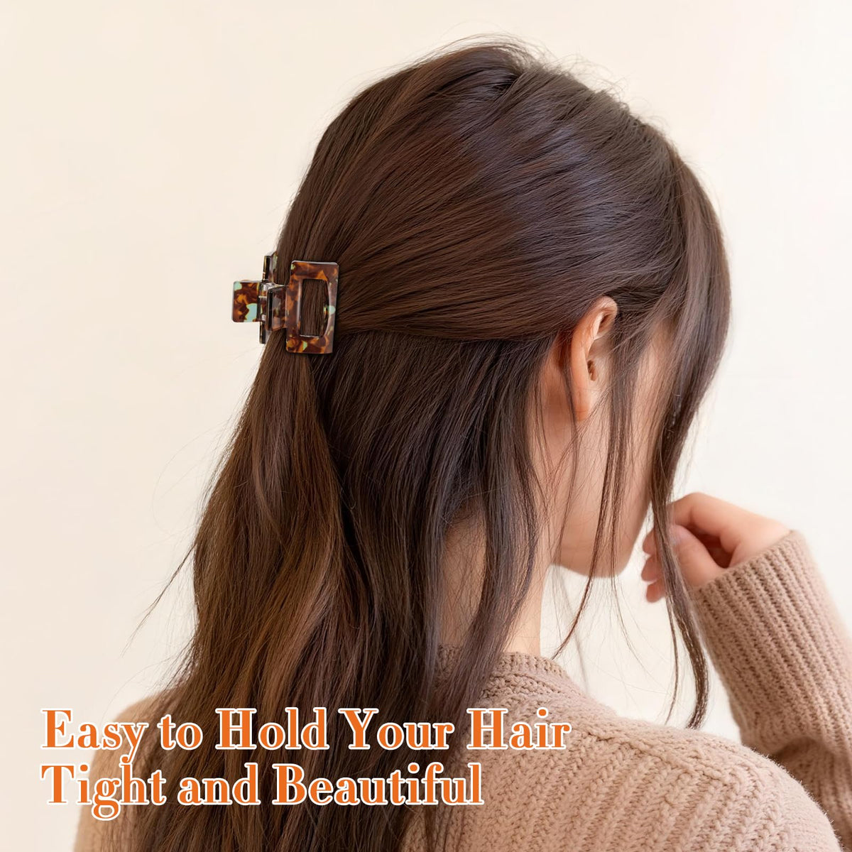 Interesse clip securing bangs demonstrating gentle grip and tidy styling