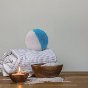 INTEYE bathtub lifestyle scene with lit candles, promoting relaxing soak experience