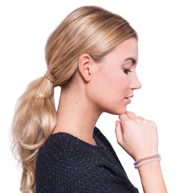 invisibobble SLIM in a low ponytail showing secure no-kink hold