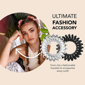 invisibobble next to a hand showing scale and easy portability benefit