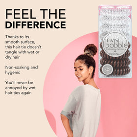 invisibobble worn as a bracelet on wrist, stylish and handy for quick hair ties