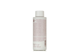 IRALTONE label close-up highlighting ingredients and benefits for scalp stimulation