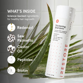 iRestore being applied to wet hair for improved scalp nourishment