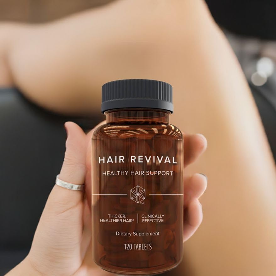 Isagenix bottle open with tablets spilling to show daily dose