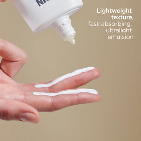 ISDIN applied under makeup demonstrating smooth base and no white cast
