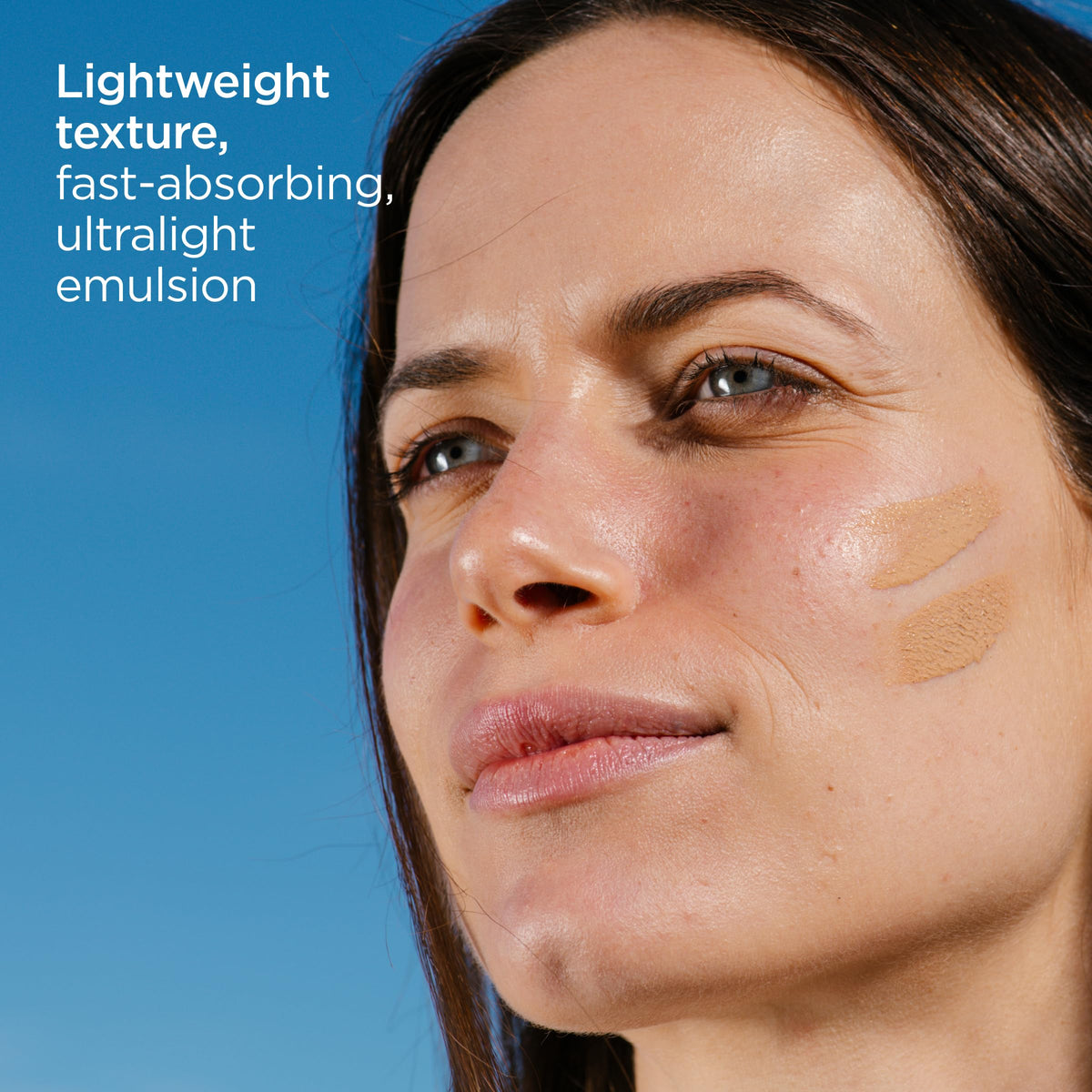 ISDIN Eryfotona Ageless tinted swatch on skin demonstrating no white cast