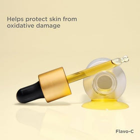 ISDIN Flavo-C bottle label detail emphasizing brand and ingredient transparency