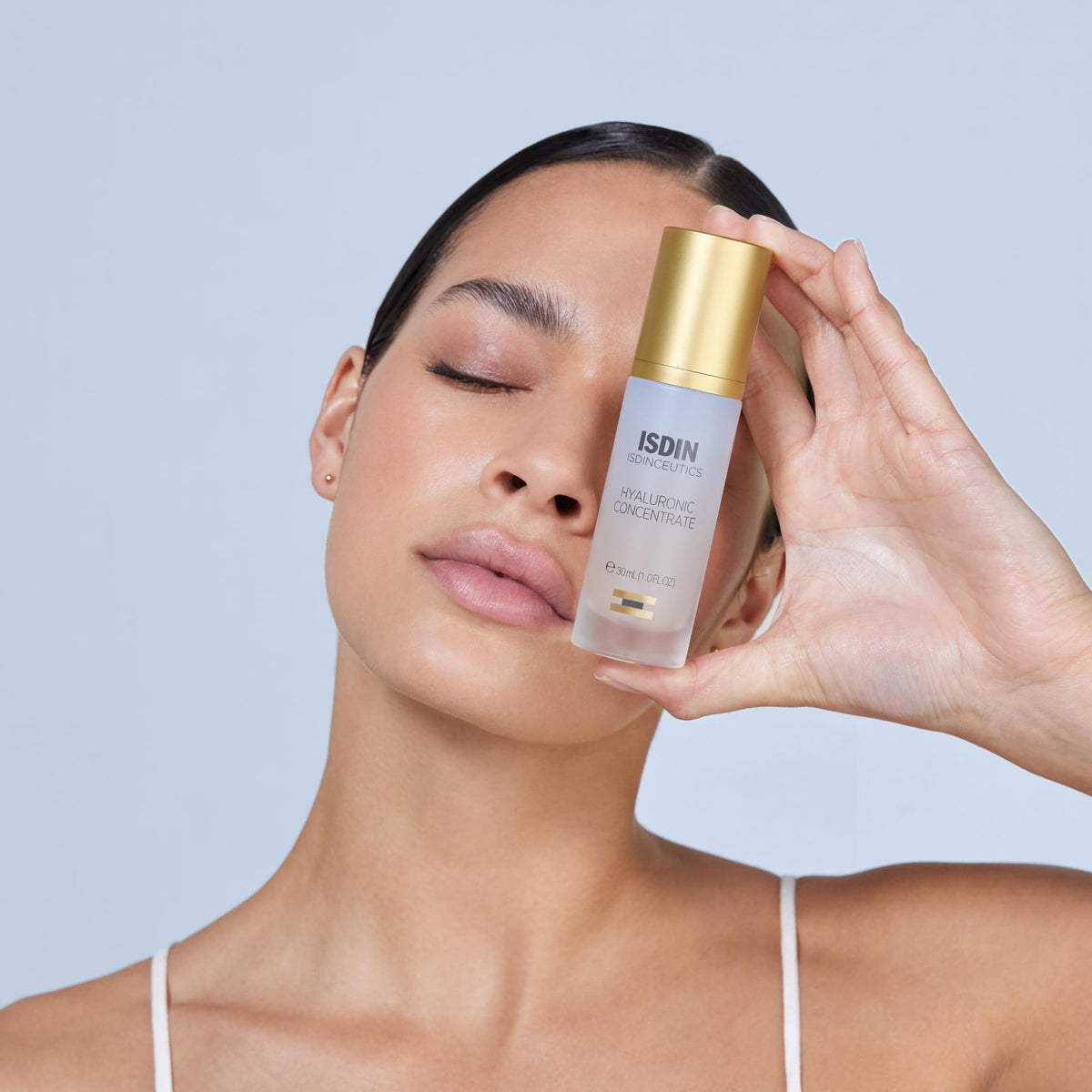 ISDIN dropper dispensing serum illustrating precise application benefit