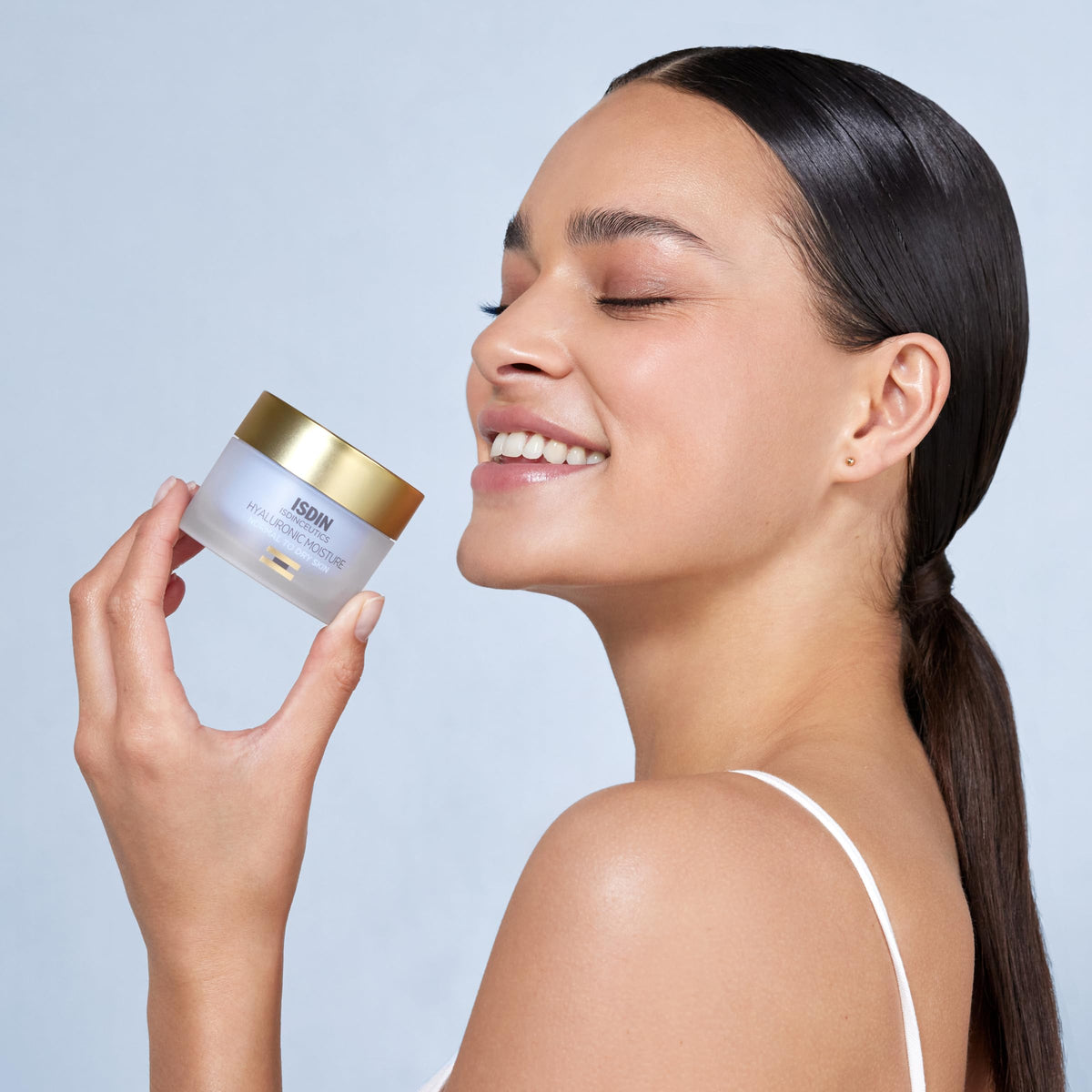 ISDIN open jar texture close-up displaying creamy hyaluronic gel-cream and lightweight feel