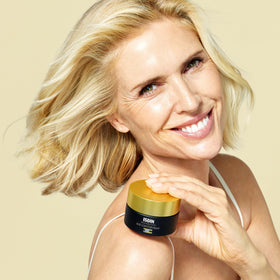 ISDIN jar open with visible cream, demonstrates smooth texture benefit