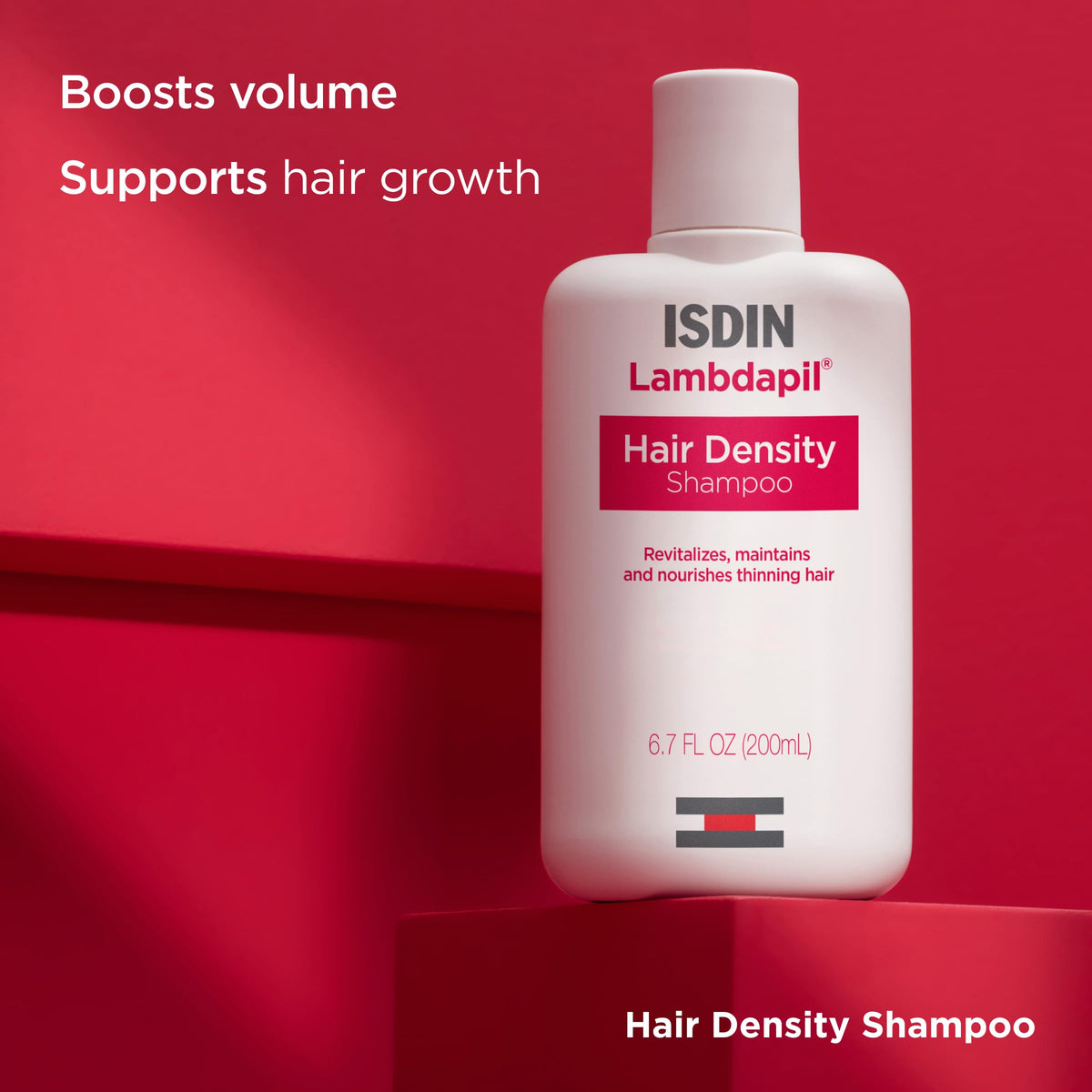 ISDIN Lambdapil shampoo pouring from bottle showing texture and spreadability