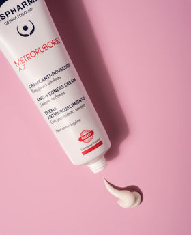 IsisPharma tube cap and nozzle detail highlighting precise product dispensing