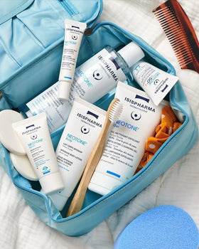 IsisPharma bottle in hand for scale indicating compact 3.38 fl oz travel-friendly benefit