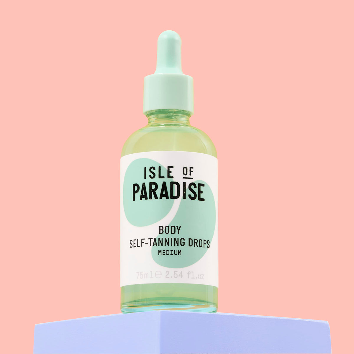 Isle of Paradise dropper close-up demonstrating precise dosing for customizable tan