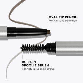 IT Cosmetics pencil in hand showing compact travel-friendly size and convenience