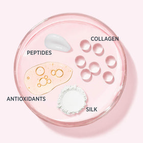 IT Cosmetics jar beside teaspoon for scale, highlights compact travel-ready size