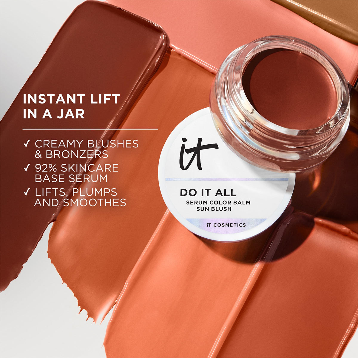 IT Cosmetics swatch on skin demonstrating Sunlit warm color payoff and buildability