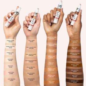 IT Cosmetics applicator applying concealer under eye to brighten and conceal