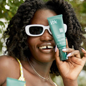 ITK product spread on hand demonstrating quick absorption and non-greasy feel